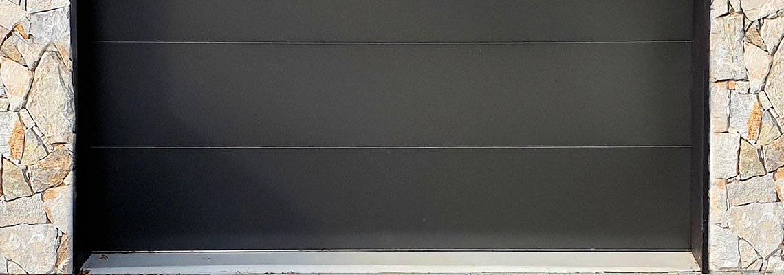 Overhead Black Garage Door Installation in St Cloud, Florida