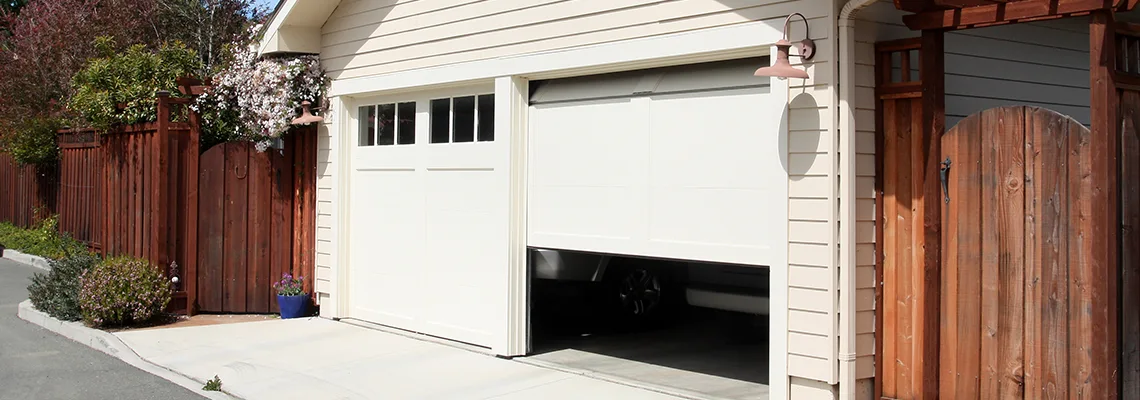 Fix Metal Garage Door Jerking in St Cloud